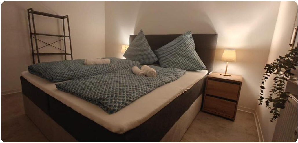 Bergsonne – Schlafzimmer 2 mit Doppelbett