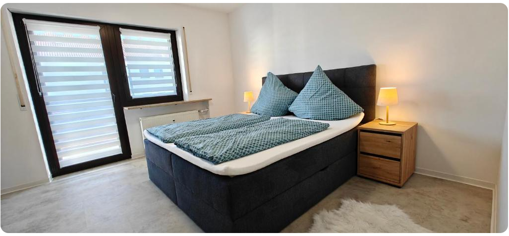 Bergsonne – Schlafzimmer 1 mit Doppelbett